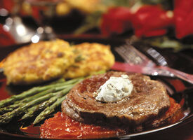 Rib-Eye Steaks with Blue Cheese and Red Pepper Coulis
